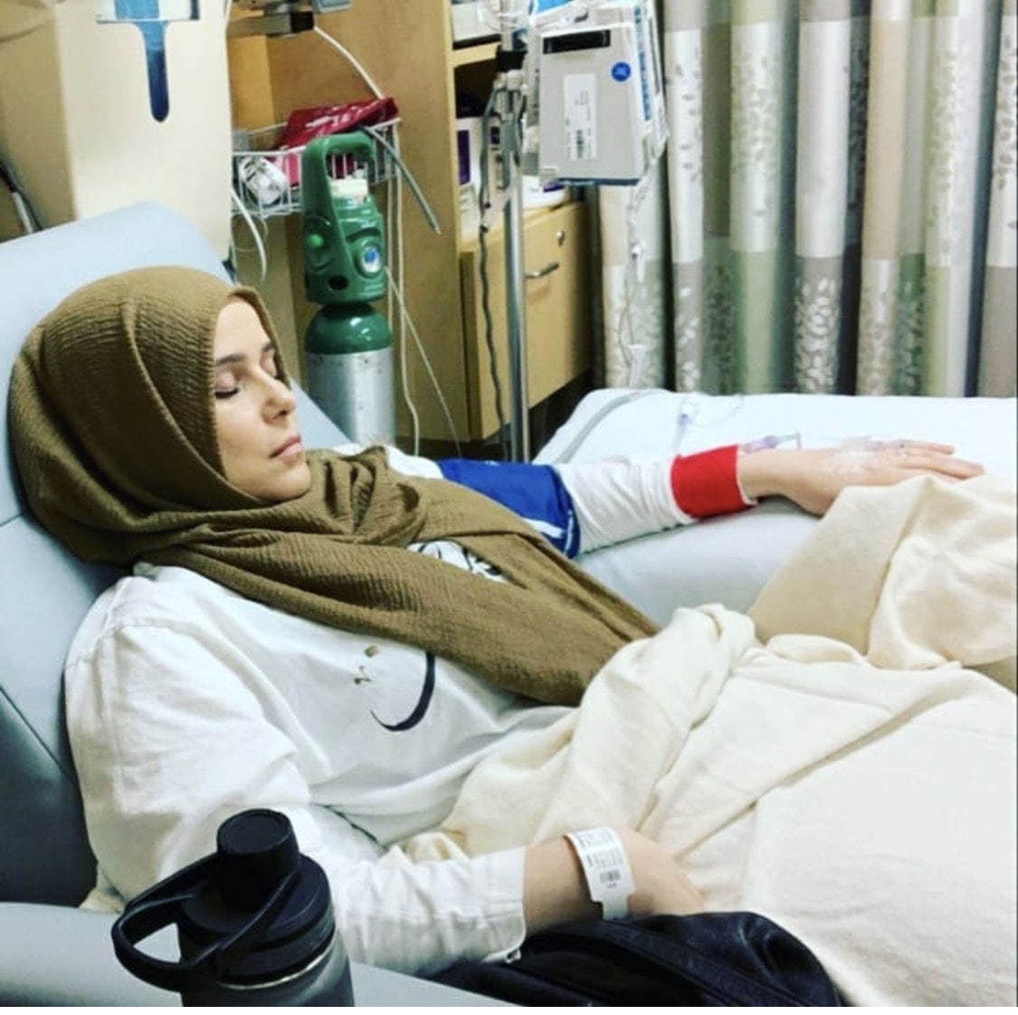 a muslim hijabi female on a hospital bed with the diagnosis - Multiple Sclerosis