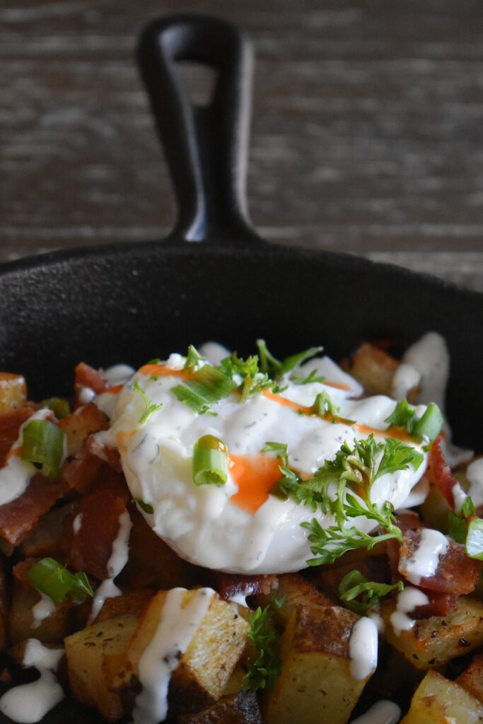 Potato and egg on a skillet