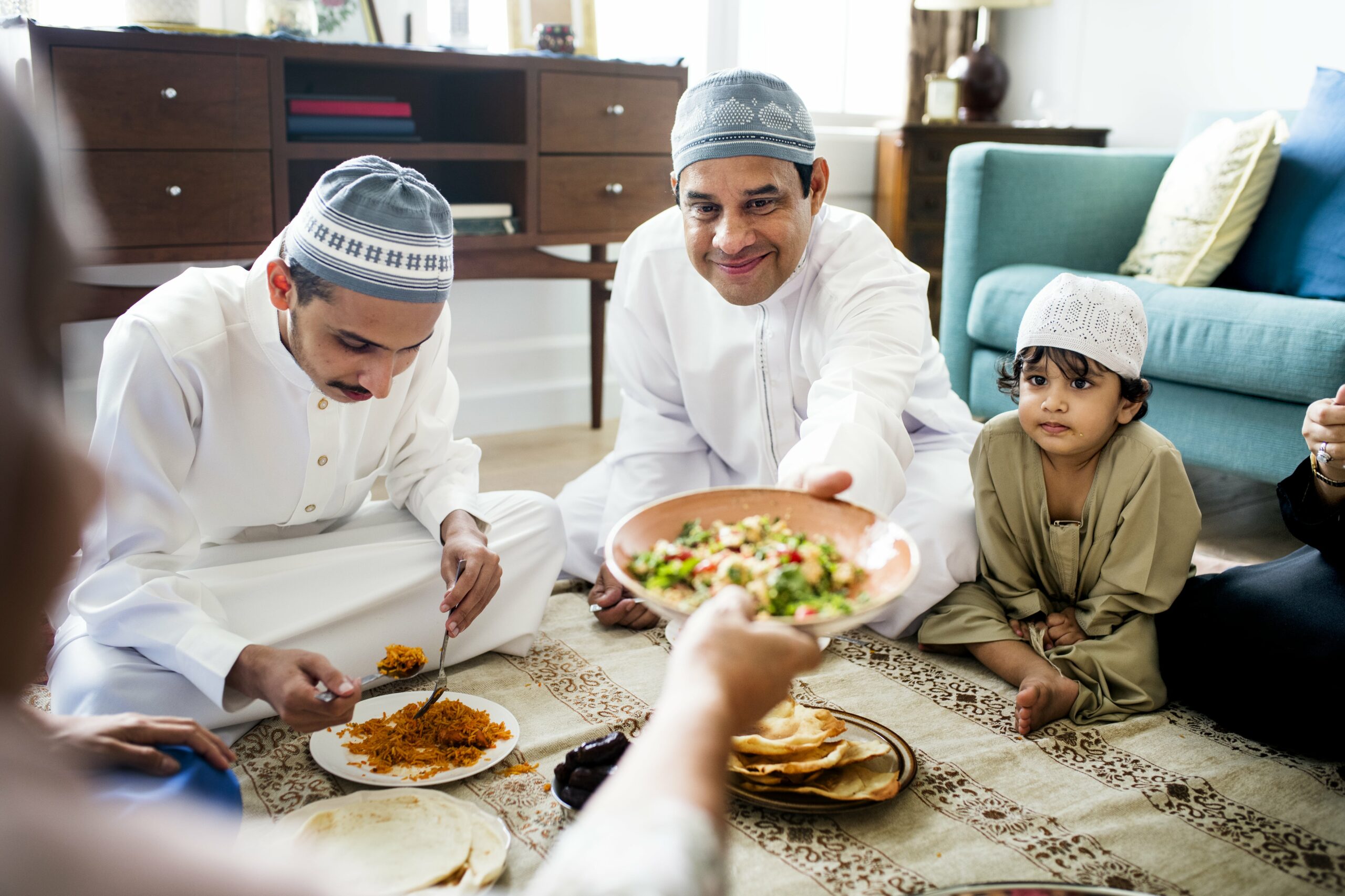 muslim family having dinner together