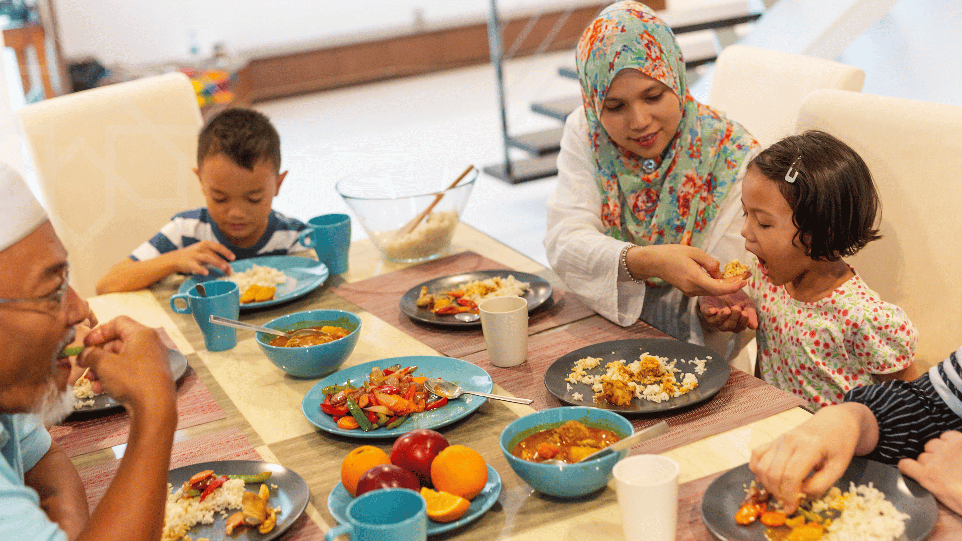 Muslim family fasting during Muharram and breaking fast together